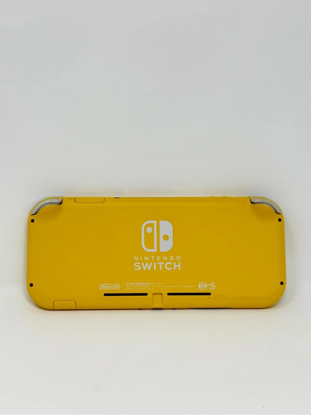 Nintendo Switch Lite Yellow Handheld Gaming Console with White Buttons